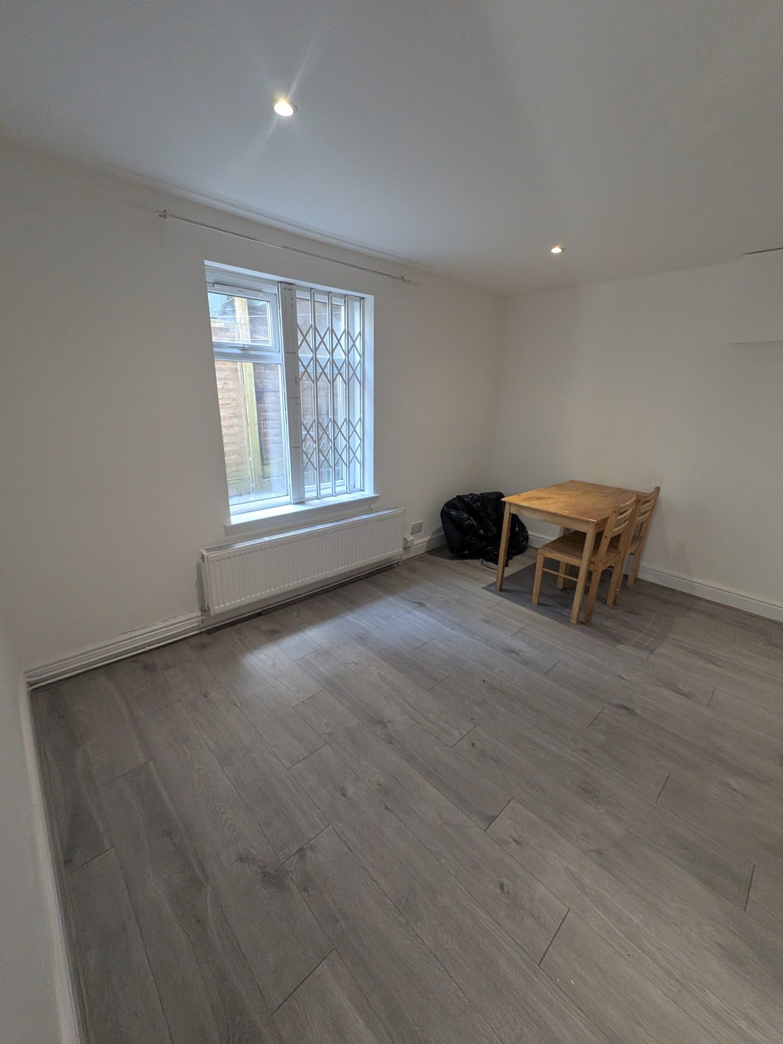 The same Harlesden NW10 room after the damp was treated and the walls redecorated