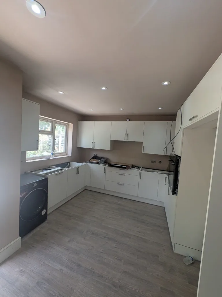 Kitchen in Edgware HA8 part-way through fitting, units in place with no worktop yet