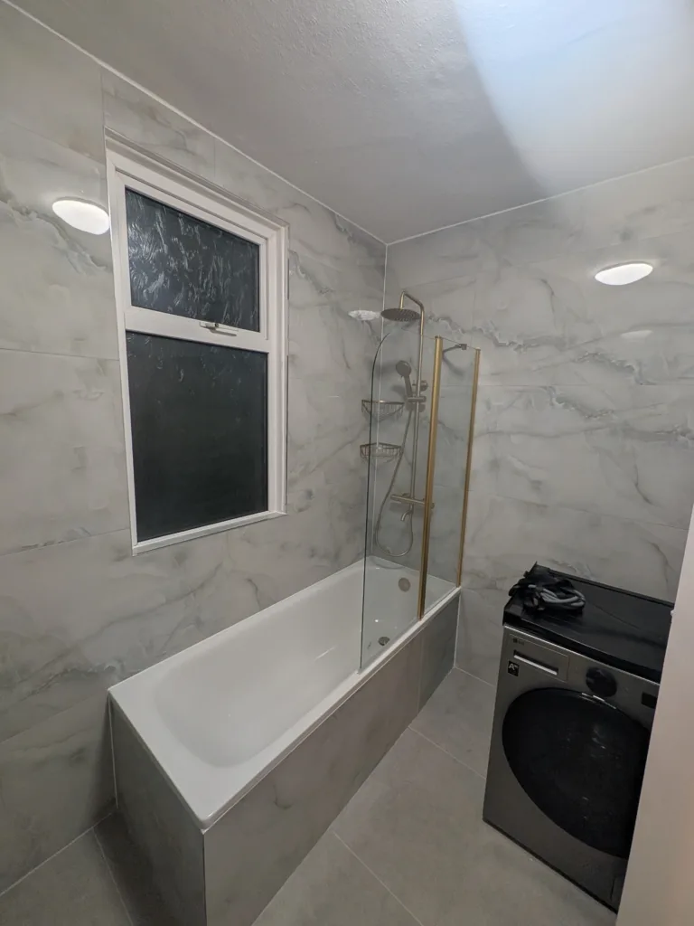 Grey marble-tile walk-in shower bathroom after refurbishment, Golders Green NW11
